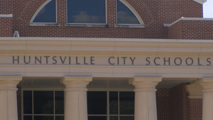 Huntsville City School parent concerned about his children's education